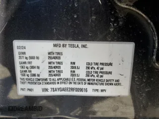 2024 Tesla Model Y Long Range z VIN 7SAYGAEE2RF009616, wystawiony jako Copart lot #46139805 z przebiegiem 6 535 mil mil oraz Szkoda całkowita • Salvage title. Historia ofert i sprzedaży dostępna na DreamBid. Obrazek 13.