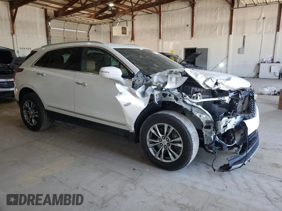 2020 Cadillac XT5 Premium Luxury FWD with VIN 1GYKNCRS9LZ235779, listed as a Copart auction lot 47775965 with 59,501 mi miles and Salvage Title. Bid and sale history available at carsss.com. Image 4.