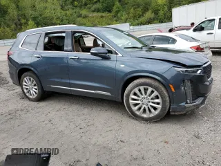 2020 Cadillac XT6 AWD Premium Luxury with VIN 1GYKPFRS1LZ148342, listed as a Copart auction lot 73495264 with 100,702 mi miles and Salvage Title. Bid and sale history available at carsss.com. Image 4.