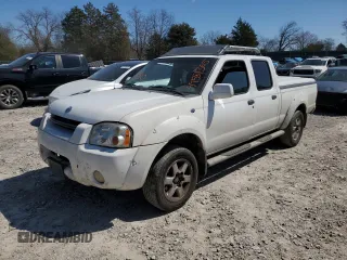 2003 Nissan Frontier SE z VIN 1N6ED29X03C441276, wystawiony jako Copart lot #49581365 z przebiegiem 361 609 mil mil oraz Czysty tytuł • Clean title. Historia ofert i sprzedaży dostępna na DreamBid. Obrazek 1.
