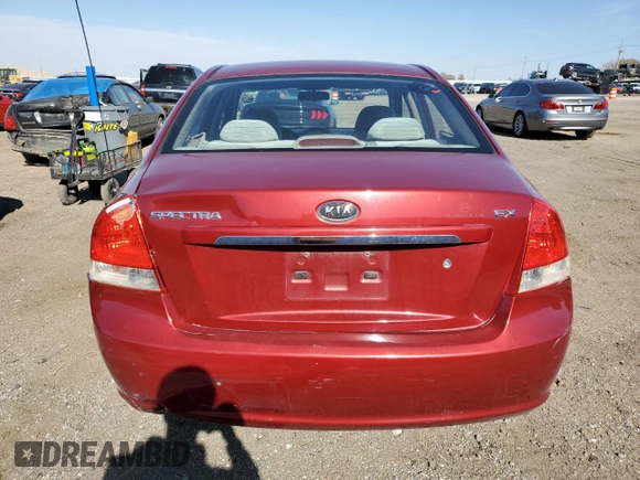 2009 Kia Spectra EX with VIN KNAFE221395656476, listed as a Copart auction lot 77700844 with 90,079 mi miles and Salvage Title. Bid and sale history available at carsss.com. Image 6.