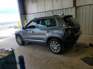 2015 Volkswagen Tiguan SE z VIN WVGBV7AX0FW588451, wystawiony jako Copart lot #51005345 z przebiegiem 104 553 mil mil oraz Szkoda całkowita • Salvage title. Historia ofert i sprzedaży dostępna na DreamBid. Obrazek 2.
