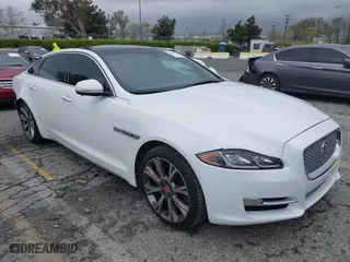 2016 Jaguar XJ with VIN SAJWA2GE3GMV93216, listed as a IAAI auction lot 41890225 with 70,007 mi miles. Bid and sale history available at carsss.com. Image 1.
