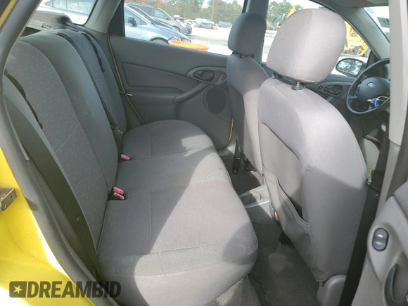 2004 Ford Focus ZX5 z VIN 3FAFP37344R117096, wystawiony jako Copart lot #82789344 z przebiegiem 188 029 mil mil oraz Szkoda całkowita • Salvage title. Historia ofert i sprzedaży dostępna na DreamBid. Obrazek 10.