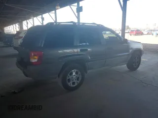 2000 Jeep Grand Cherokee Laredo with VIN 1J4GW48S0YC253091, listed as a Copart auction lot 60357255 with 218,410 mi miles and Clean title. Bid and sale history available at DreamBid. Image 3.