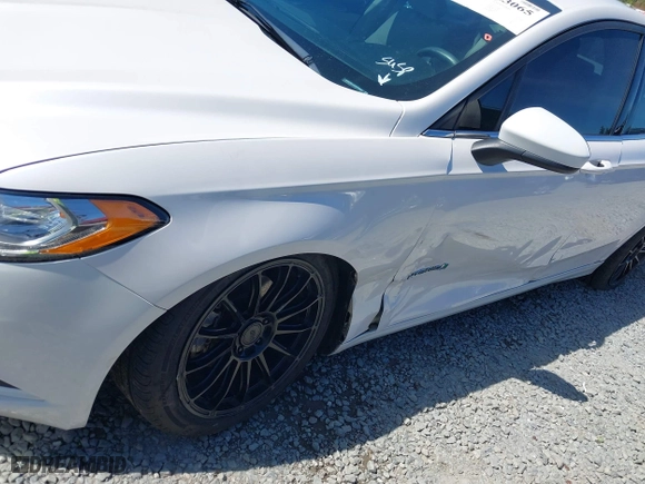 2018 Ford Fusion Hybrid SE with VIN 3FA6P0LU3JR226934, listed as a IAAI auction lot 42063065 with 126,683 mi miles. Bid and sale history available at carsss.com. Image 6.