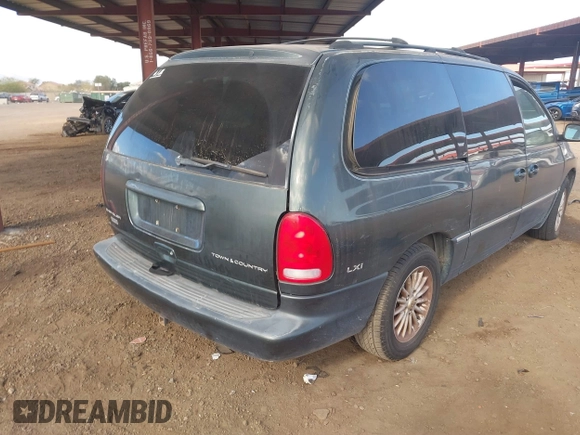 2000 Chrysler Town & Country LXi with VIN 1C4GP54L5YB671398, listed as a IAAI auction lot 41736027 with 131,923 mi miles. Bid and sale history available at carsss.com. Image 4.