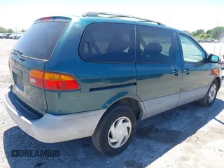 1998 Toyota Sienna LE with VIN 4T3ZF13C0WU038446, listed as a IAAI auction lot 42038331 with 228,832 mi miles. Bid and sale history available at carsss.com. Image 4.