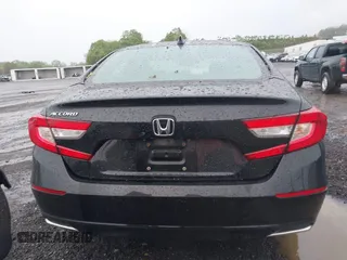 2018 Honda Accord EX with VIN 1HGCV1F4XJA199943, listed as a IAAI auction lot 42263663 with 96,698 mi miles and . Bid and sale history available at DreamBid. Image 16.