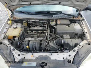 2005 Ford Focus S with VIN 1FAFP34N55W115653, listed as a Copart auction lot 63043315 with 110,593 mi miles and Salvage title. Bid and sale history available at DreamBid. Image 11.