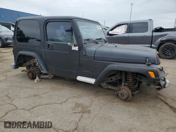 2002 Jeep Wrangler Sport z VIN 1J4FA49S22P763189, wystawiony jako Copart lot #57650295 z przebiegiem 197 383 mil mil oraz Czysty tytuł • Clean title. Historia ofert i sprzedaży dostępna na DreamBid. Obrazek 4.