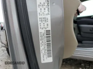 2014 Dodge Grand Caravan SXT z VIN 2C4RDGCG9ER179424, wystawiony jako Copart lot #58532245 z przebiegiem 193 409 mil mil oraz Szkoda całkowita • Salvage title. Historia ofert i sprzedaży dostępna na DreamBid. Obrazek 13.