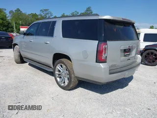 2018 GMC Yukon XL SLT with VIN 1GKS1GKC6JR113510, listed as a IAAI auction lot 42006987 with 161,389 mi miles and . Bid and sale history available at carsss.com. Image 3.