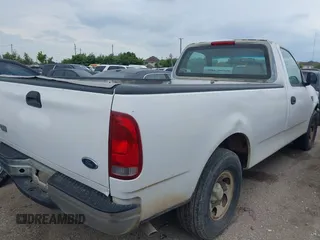1998 Ford F-150 with VIN 1FTRF1764WKB01383, listed as a IAAI auction lot 42310759 with 51,902 mi miles and . Bid and sale history available at DreamBid. Image 4.