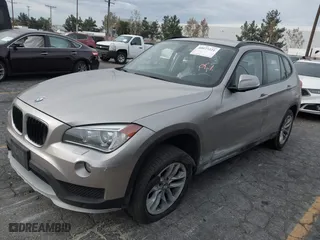 2015 BMW X1 xDrive28i with VIN WBAVL1C55FVY41749, listed as a IAAI auction lot 40977221 with 120,924 mi miles. Bid and sale history available at carsss.com. Image 17.