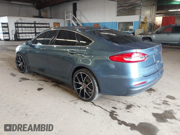 2019 Ford Fusion SEL with VIN 3FA6P0CD6KR145380, listed as a IAAI auction lot 40911980 with 58,825 mi miles. Bid and sale history available at carsss.com. Image 3.