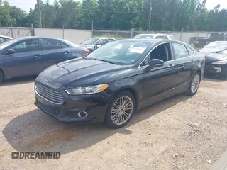 2015 Ford Fusion SE z VIN 3FA6P0HD4FR126292, wystawiony jako IAAI lot #42418564 z przebiegiem 152 795 mil mil oraz . Historia ofert i sprzedaży dostępna na DreamBid. Obrazek 2.