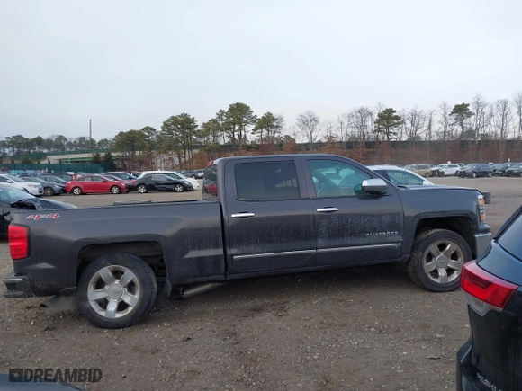 2014 Chevrolet Silverado 1500 LTZ with VIN 3GCUKSEC4EG384636, listed as a IAAI auction lot 41352484 with 153,976 mi miles. Bid and sale history available at carsss.com. Image 13.
