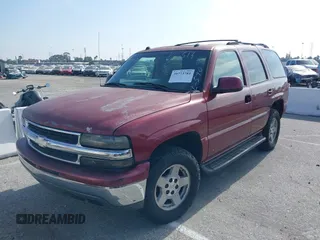 2004 Chevrolet Tahoe LS with VIN 1GNEC13T64J226513, listed as a IAAI auction lot 39773781 with 250,788 mi miles. Bid and sale history available at carsss.com. Image 2.