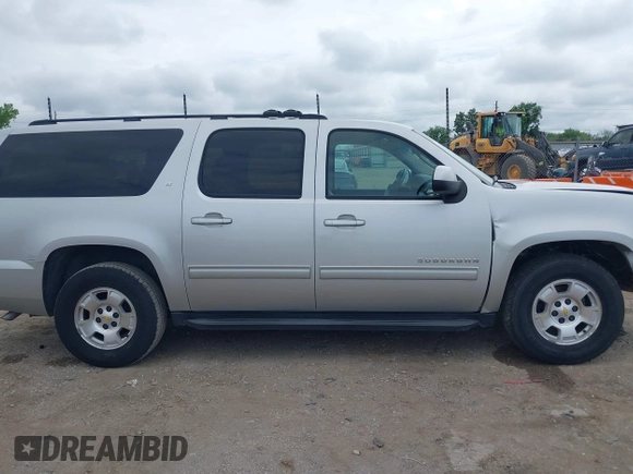 2011 Chevrolet Suburban LT with VIN 1GNSCJE05BR294452, listed as a IAAI auction lot 42107580 with 165,313 mi miles and . Bid and sale history available at DreamBid. Image 14.