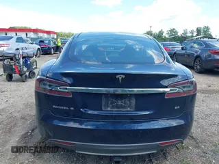 2013 Tesla Model S with VIN 5YJSA1CN0DFP21851, listed as a IAAI auction lot 42557791 with 106,328 mi miles and . Bid and sale history available at DreamBid. Image 17.