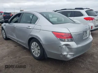 2008 Honda Accord LX z VIN JHMCP26328C052454, wystawiony jako IAAI lot #42106992 z przebiegiem 129 582 mil mil oraz . Historia ofert i sprzedaży dostępna na DreamBid. Obrazek 3.