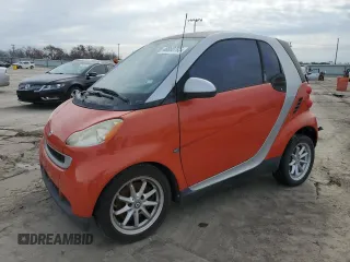 2008 Smart fortwo Pure z VIN WMEEJ31X08K094401, wystawiony jako Copart lot #46860795 z przebiegiem Nie podano mil oraz Tytuł czysty. Historia ofert i sprzedaży dostępna na DreamBid. Obrazek 1.