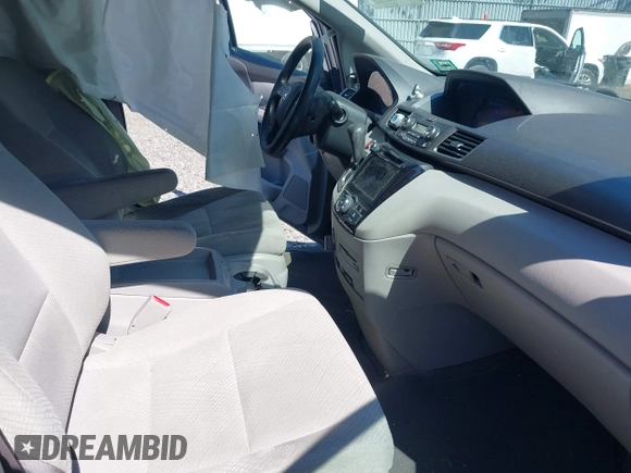 2016 Honda Odyssey SE with VIN 5FNRL5H39GB048487, listed as a IAAI auction lot 42059132 with 140,411 mi miles and . Bid and sale history available at DreamBid. Image 5.
