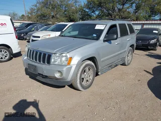 2007 Jeep Grand Cherokee Laredo with VIN 1J8HS48P77C595484, listed as a IAAI auction lot 41775290 with 176,751 mi miles. Bid and sale history available at carsss.com. Image 2.