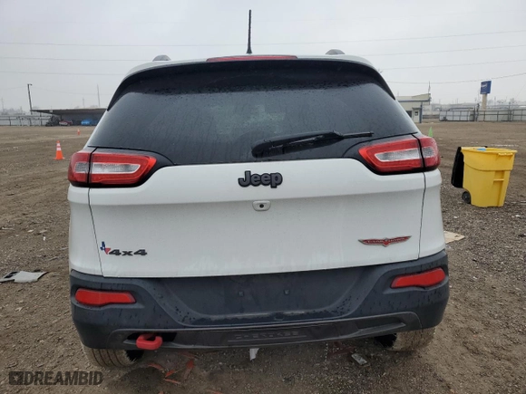 2015 Jeep Cherokee Trailhawk with VIN 1C4PJMBB5FW712933, listed as a Copart auction lot 45844265 with 90,827 mi miles and Salvage Title. Bid and sale history available at carsss.com. Image 6.