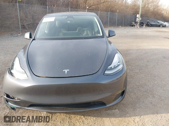 2023 Tesla Model Y Long Range with VIN 7SAYGAEEXPF612231, listed as a IAAI auction lot 41758243 with 32,924 mi miles and . Bid and sale history available at DreamBid. Image 13.