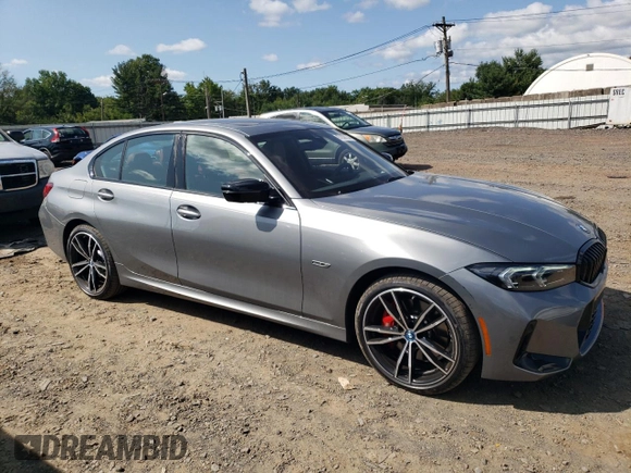 2023 BMW 3 Series 330e xDrive with VIN 3MW39FS02P8D01319, listed as a Copart auction lot 67836734 with 12,883 mi miles and Salvage Title. Bid and sale history available at carsss.com. Image 4.