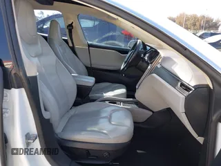 2014 Tesla Model S 60 with VIN 5YJSA1H15EFP46980, listed as a IAAI auction lot 41583672 with 61,080 mi miles and . Bid and sale history available at DreamBid. Image 5.
