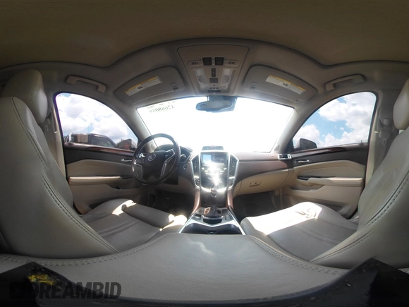 2014 Cadillac SRX Performance Collection with VIN 3GYFNFE34ES677712, listed as a IAAI auction lot 42668059 with 150,135 mi miles and . Bid and sale history available at DreamBid. Image 18.