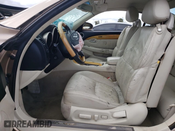 2002 Lexus SC 430 with VIN JTHFN48Y320010682, listed as a Copart auction lot 60476285 with 198,630 mi miles and Salvage title. Bid and sale history available at DreamBid. Image 7.
