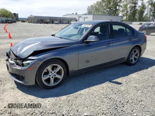 2014 BMW 3 Series 320i with VIN WBA3B1C54EK132952, listed as a Copart auction lot 63653435 with 63,260 mi miles and Salvage title. Bid and sale history available at DreamBid. Image 1.