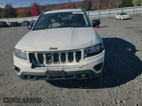 2017 Jeep Compass 75th Anniversary Edition with VIN 1C4NJDBBXHD168127, listed as a Copart auction lot 77858624 with 82,702 mi miles and Salvage Title. Bid and sale history available at carsss.com. Image 11.