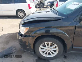 2013 Dodge Journey SXT with VIN 3C4PDDBG1DT606887, listed as a IAAI auction lot 42440507 with 250,836 mi miles and . Bid and sale history available at DreamBid. Image 13.