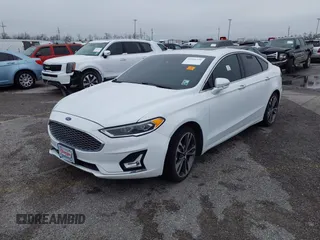 2019 Ford Fusion Titanium with VIN 3FA6P0D9XKR186685, listed as a IAAI auction lot 39181239 with Not provided miles and . Bid and sale history available at DreamBid. Image 2.