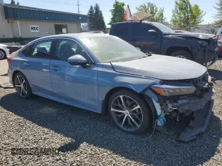 2022 Honda Civic Touring with VIN 2HGFE1F90NH319961, listed as a Copart auction lot 57799335 with 36,458 mi miles and Salvage title. Bid and sale history available at DreamBid. Image 4.