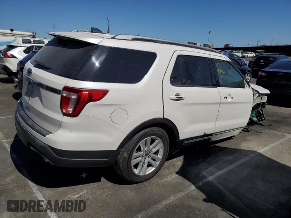 2018 Ford Explorer XLT с VIN 1FM5K7D83JGA56317, выставлен на аукционе Copart как лот 63529225 с пробегом 56 975 миль миль и Списание • Salvage title. История ставок и продаж доступна на DreamBid. Изображение 3.