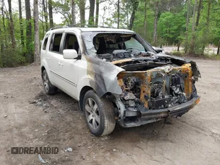 2014 Honda Pilot Touring z VIN 5FNYF4H93EB022045, wystawiony jako IAAI lot #42060815 z przebiegiem Nie podano mil oraz . Historia ofert i sprzedaży dostępna na DreamBid. Obrazek 1.