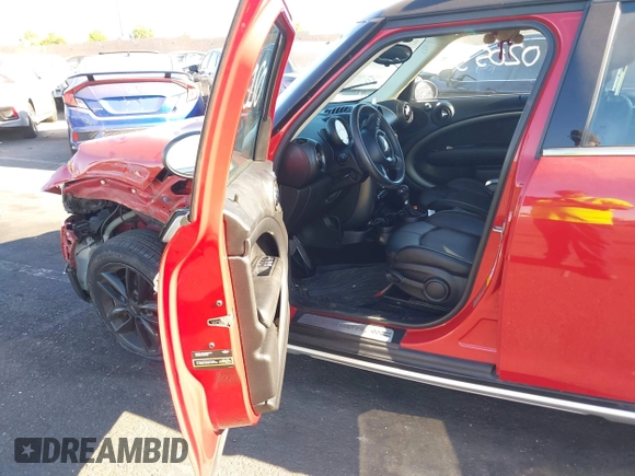 2016 MINI Countryman S with VIN WMWZC5C50GWU02754, listed as a IAAI auction lot 42702055 with 105,284 mi miles and . Bid and sale history available at DreamBid. Image 5.