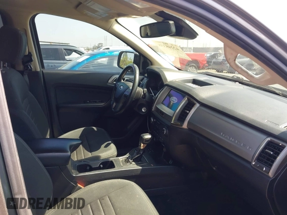 2021 Ford Ranger XL with VIN 1FTER4FHXMLD25744, listed as a IAAI auction lot 42248338 with 74,312 mi miles and . Bid and sale history available at DreamBid. Image 5.