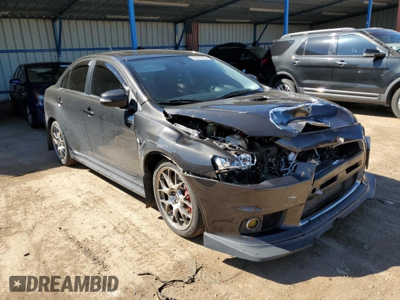 2015 Mitsubishi Lancer Evolution MR z VIN JA32W5FV5FU006111, wystawiony jako Copart lot #68985683 z przebiegiem 54 774 mil mil oraz . Historia ofert i sprzedaży dostępna na DreamBid. Obrazek 4.