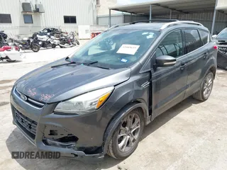 2015 Ford Escape Titanium z VIN 1FMCU0JX3FUA71770, wystawiony jako IAAI lot #42085635 z przebiegiem 141 890 mil mil oraz . Historia ofert i sprzedaży dostępna na DreamBid. Obrazek 17.
