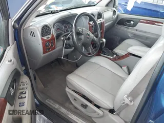 2006 GMC Envoy SLE with VIN 1GKDS13S562252049, listed as a IAAI auction lot 41940052 with 149,445 mi miles. Bid and sale history available at carsss.com. Image 5.