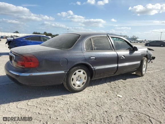 2001 Lincoln Continental with VIN 1LNHM97V21Y680964, listed as a Copart auction lot 80640714 with 0 mi miles and Salvage Title. Bid and sale history available at carsss.com. Image 3.