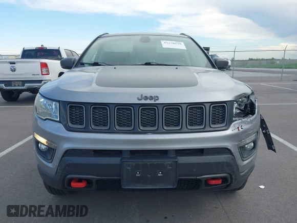 2019 Jeep Compass Trailhawk z VIN 3C4NJDDB6KT722424, wystawiony jako IAAI lot #42270528 z przebiegiem 98 007 mil mil oraz . Historia ofert i sprzedaży dostępna na DreamBid. Obrazek 12.