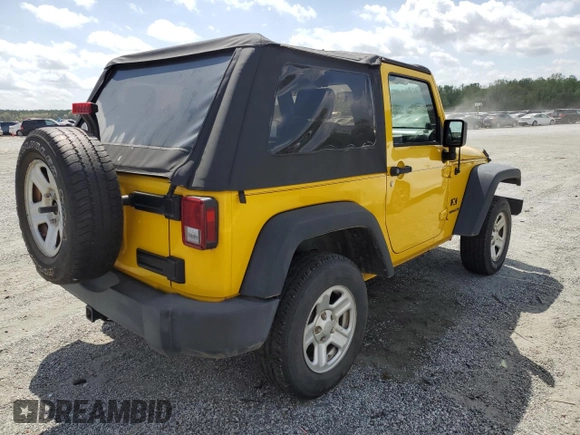2009 Jeep Wrangler X with VIN 1J4FA241X9L765664, listed as a Copart auction lot 51802065 with 137,053 mi miles and Salvage Title. Bid and sale history available at DreamBid. Image 3.